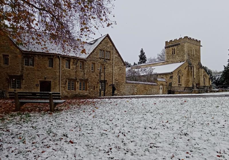 a photo of st cross church and holywell manor in snow, in Oxford