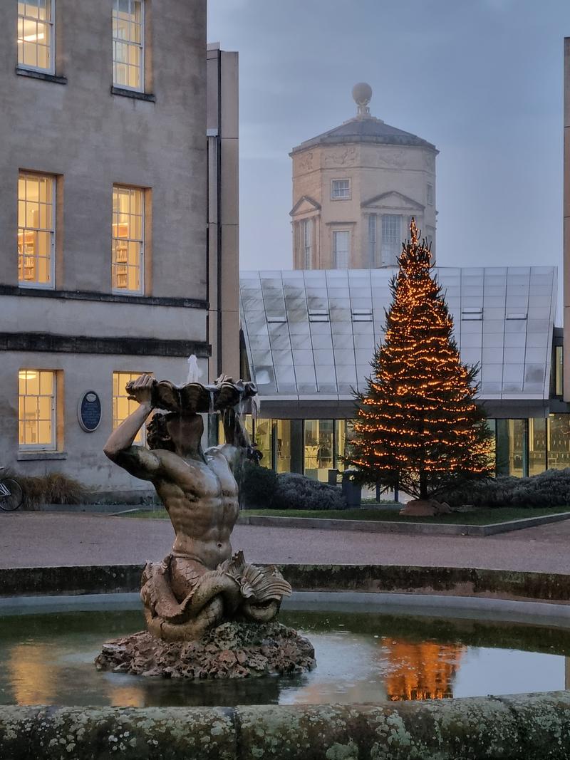 a statue decorated for Christmas in Oxford