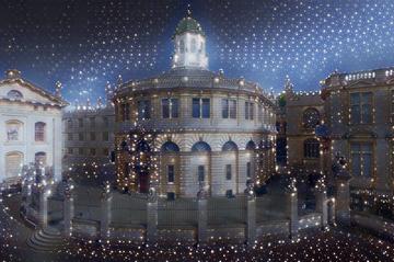 A graphic of the Sheldonian with Christmas lights and sparkles all around