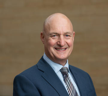 Portrait photo of Professor David Gann