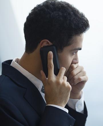 worried man on phone  shutterstock